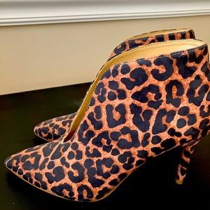 These are new never worn brown and black leopard ankle boots without tags.